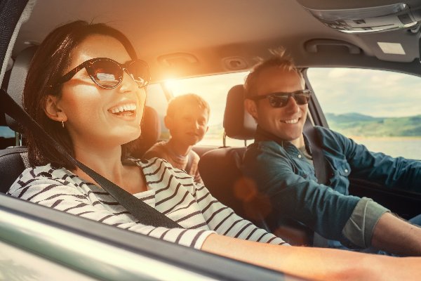 people laughing in car