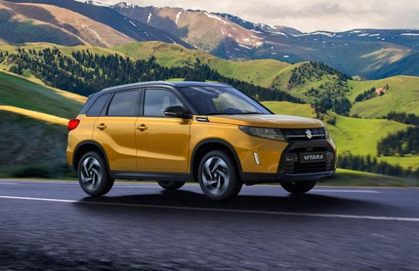 Suzuki vitara in yellow driving